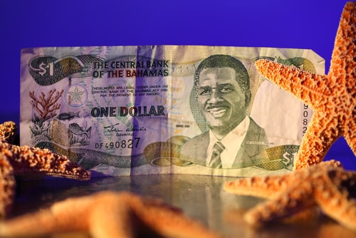 One Bahamian dollar.