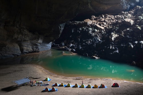 Camping in the world's biggest cave Son Doong Cave.