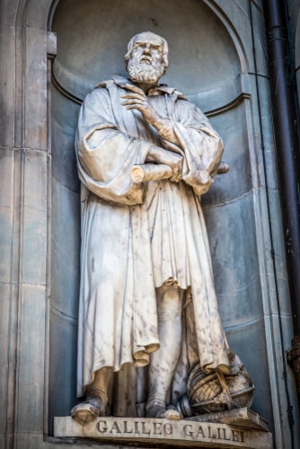 Statue of Galileo Galilei, on the facade of the Uffizi gallery. Florence, Tuscany, Italy.