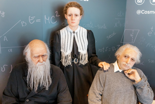 The wax figure of Albert Einstein, chemist Mendeleev and physicist madame Curie in Cosmocaixa science museum.