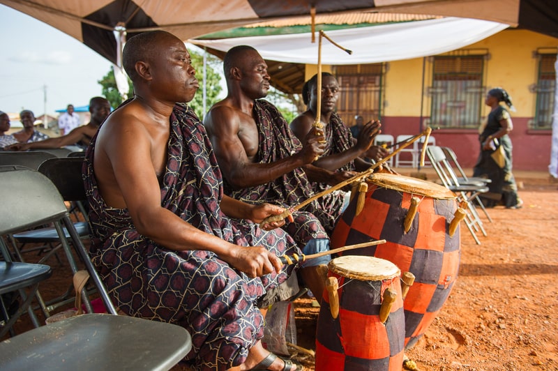 Ghanaian local musicians play the traditional African music with the drums in Ghana