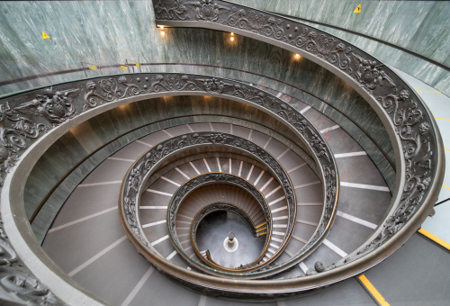 The famous spiral stairs inside the Vatican Museum.