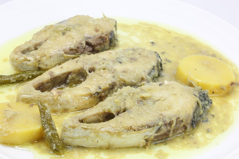 Mustard Hilsha Fish curry delicacy cuisine Bengali. Bangladesh fact file. 