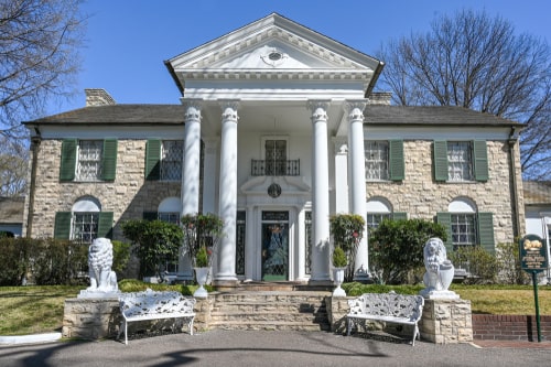 Graceland in Memphis. The mansion was built in 1939 but later bought by Elvis Presley who lived here from 1957-1977. Facts about Tennessee