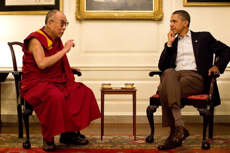 President Barack Obama meets with His Holiness the XIV Dalai Lama in the Map Room of the White House, Saturday, July 16, 2011.-min