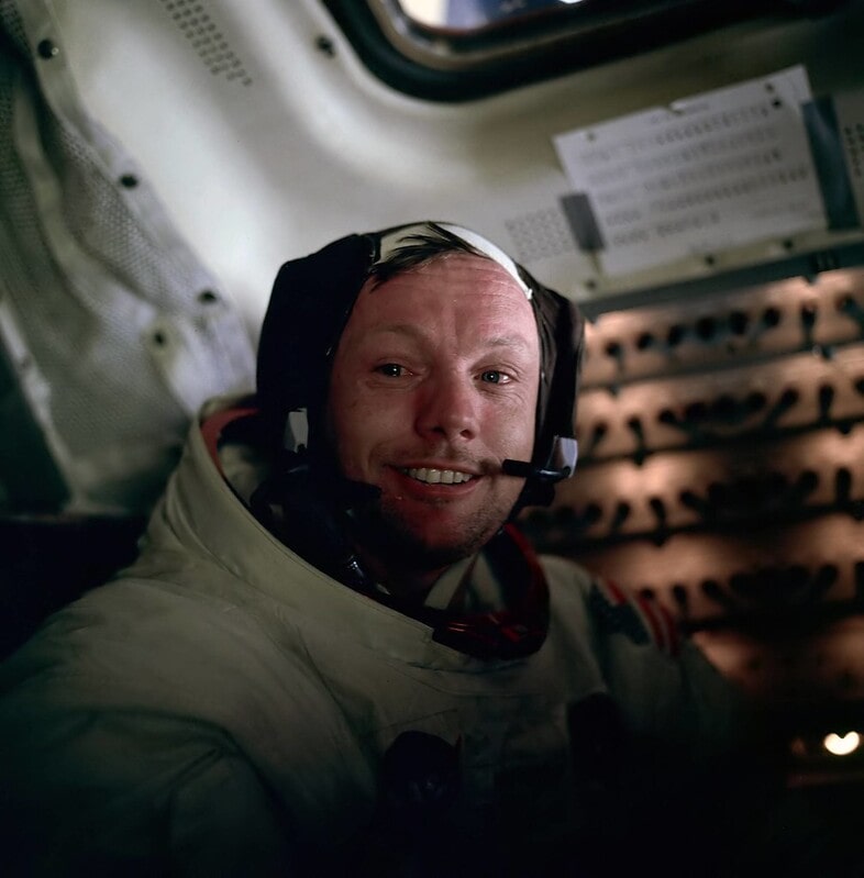 Neil Armstrong sits in the lunar module after a historic moonwalk.