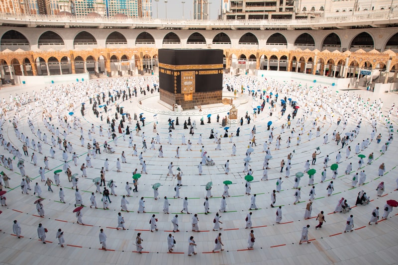 Muslim pilgrims in Al Haram Mosque Makkah performing Tawaf. Saudi Arabia fact file