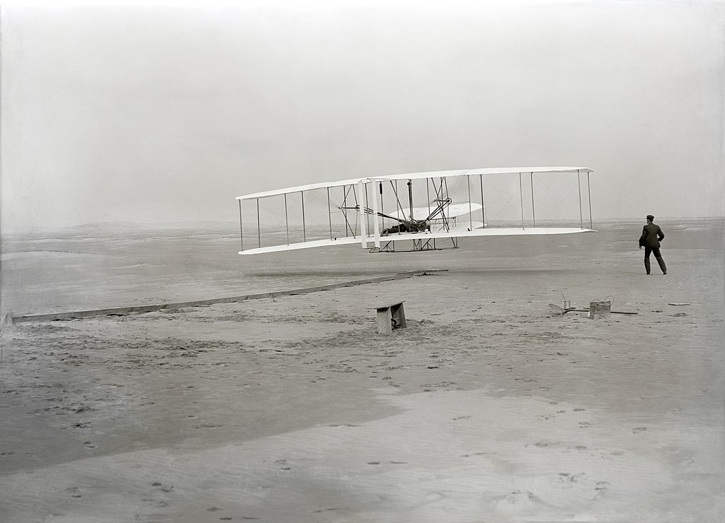 The first flight of the Wright Flyer, December 17, 1903, Orville piloting
