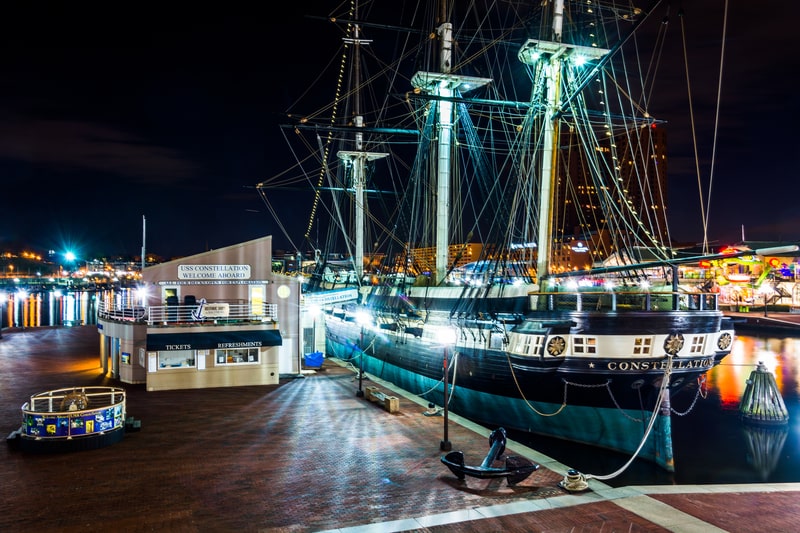 The USS Constellation at night in the Inner Harbour of Baltimore