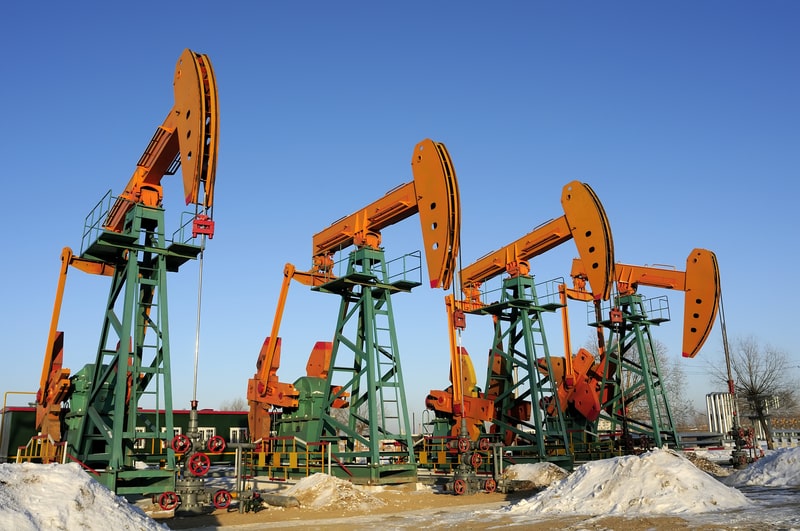 Oil derrick pumps oil or natural gas from underground