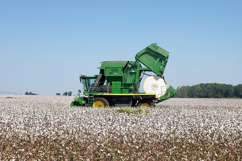 A cotton harvesting machine with a bale of cotton